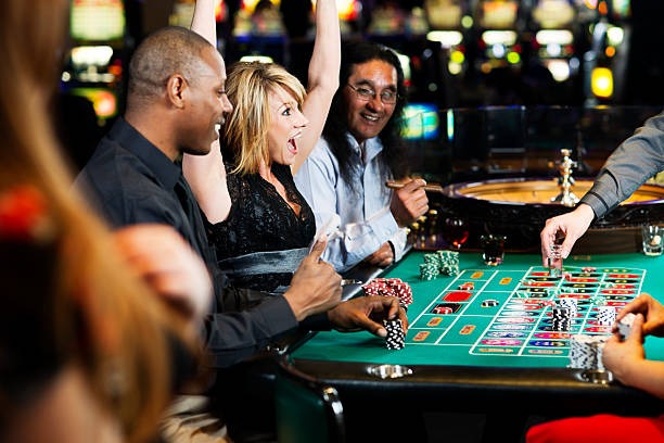 Dealer managing poker table action
